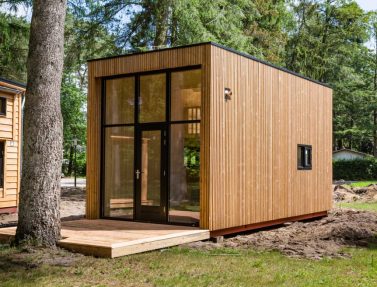 Beekbergen, Netherlands, June 21 2019: Wooden tiny house under construction. A new form of living philosophy to reduce ecological footprint